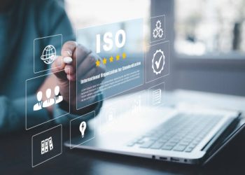 Business people working Laptops with ISO standards quality control concept, assurance warranty, Quality control standards, Researching international standards organization, Business technology concept